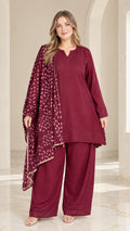 Front full view of woman wearing burgundy 3-piece tunic top, wide-leg pants, and patterned scarf set