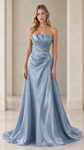 Front full-length view of woman wearing dusty blue strapless pleated satin evening gown