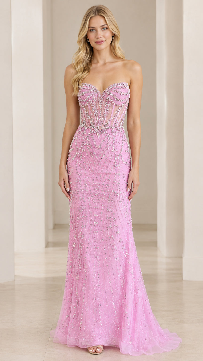 Front full view of woman wearing pink strapless beaded corset evening gown