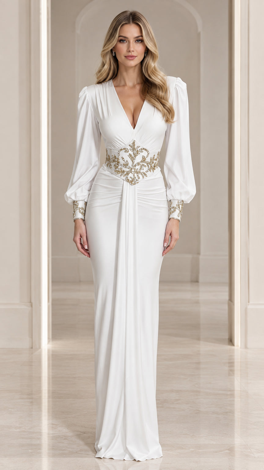 Front full-length view of model in white long sleeve evening maxi dress with gold waist embroidery