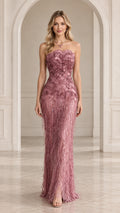 Full front view of strapless dusty rose evening maxi dress with floral appliqué and cascading fringe