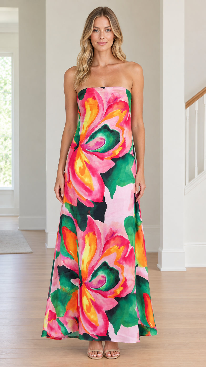 Front view of model wearing Light Pink strapless floral print maxi dress