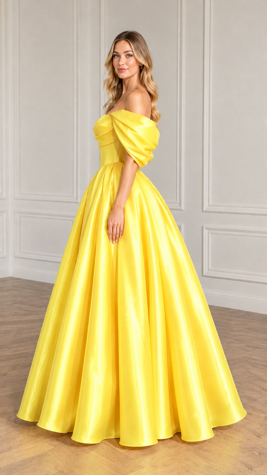 Side full-length view of the yellow corset ball gown showing skirt volume and neckline
