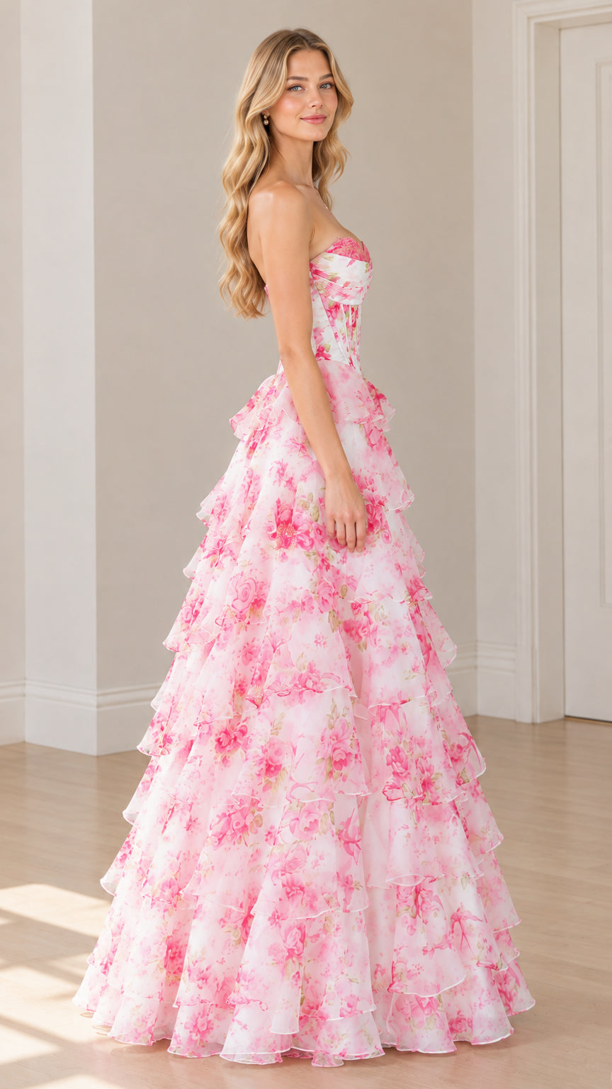 Side profile of pink floral corset ball gown with tiered ruffles
