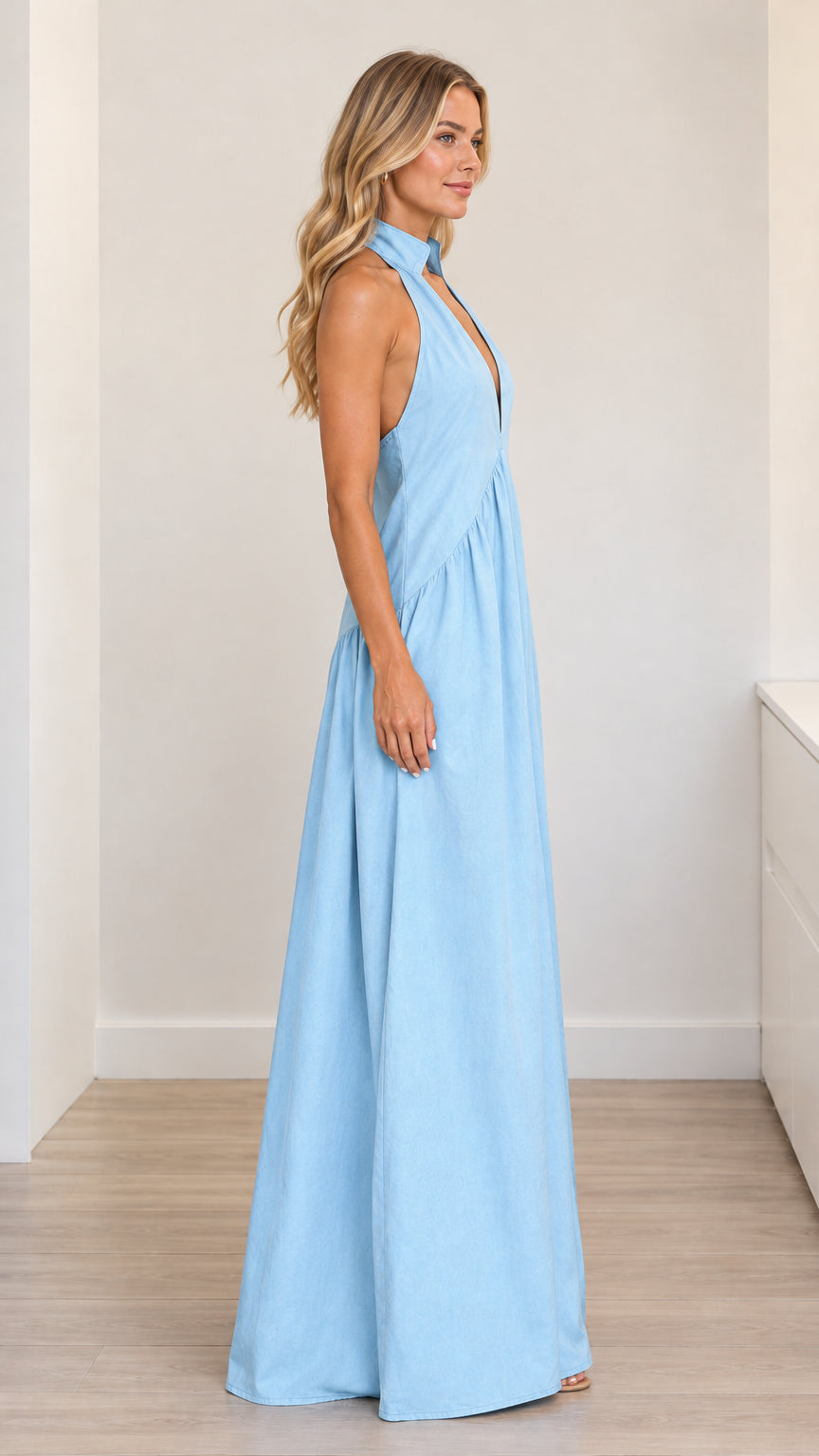 Light blue halter maxi dress side profile showing sweeping A-line silhouette