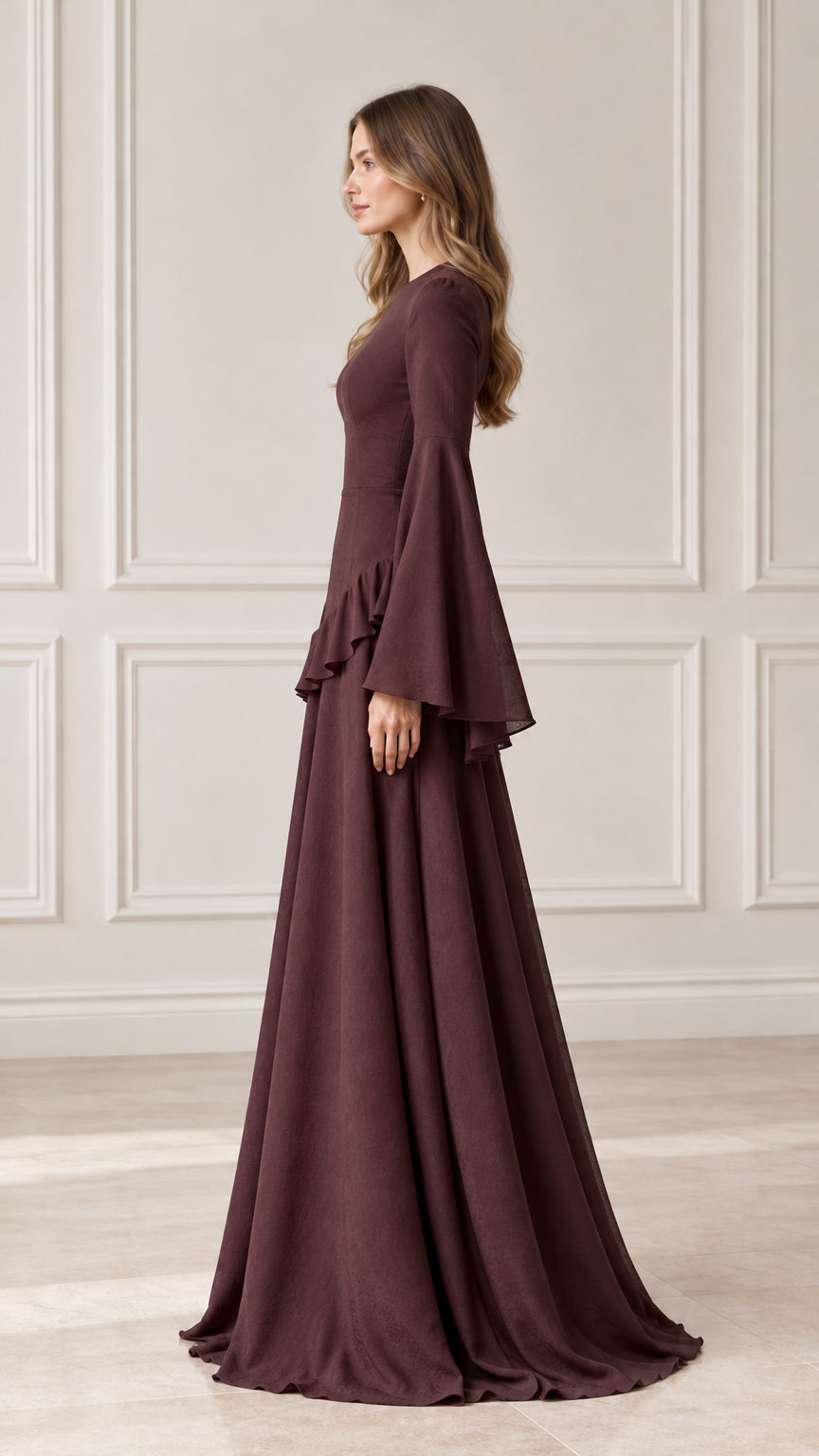 Side profile view of burgundy maxi dress with dramatic bell sleeves and flowing skirt
