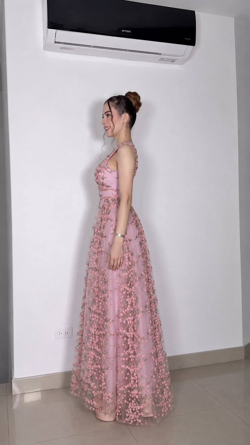 Side profile view of pink floral embroidered evening maxi dress