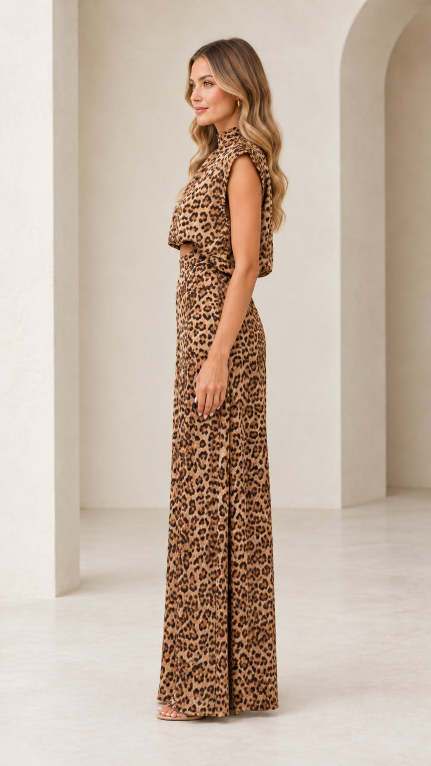 Side profile view of woman wearing brown leopard print two-piece pant set