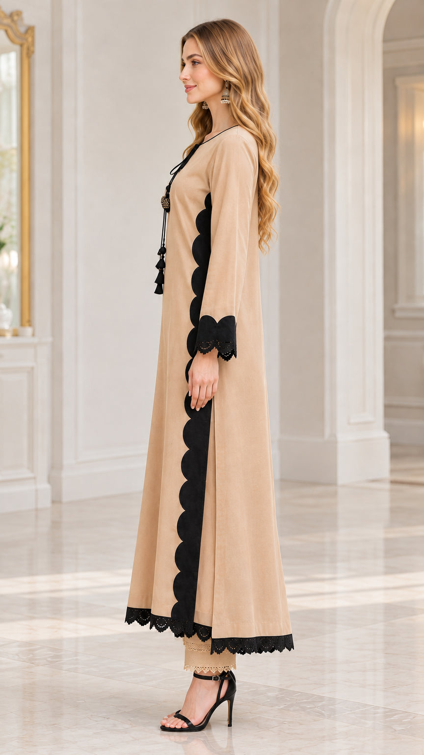 Side profile view of beige two-piece tunic set showing scalloped side panel
