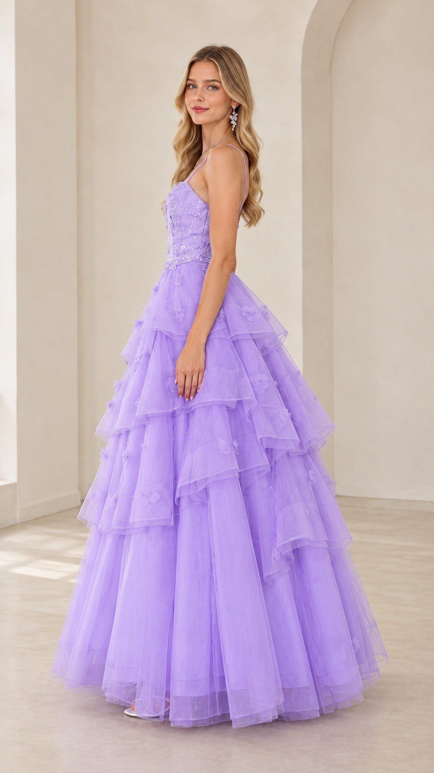 Side full view of woman in lavender tiered tulle formal dress