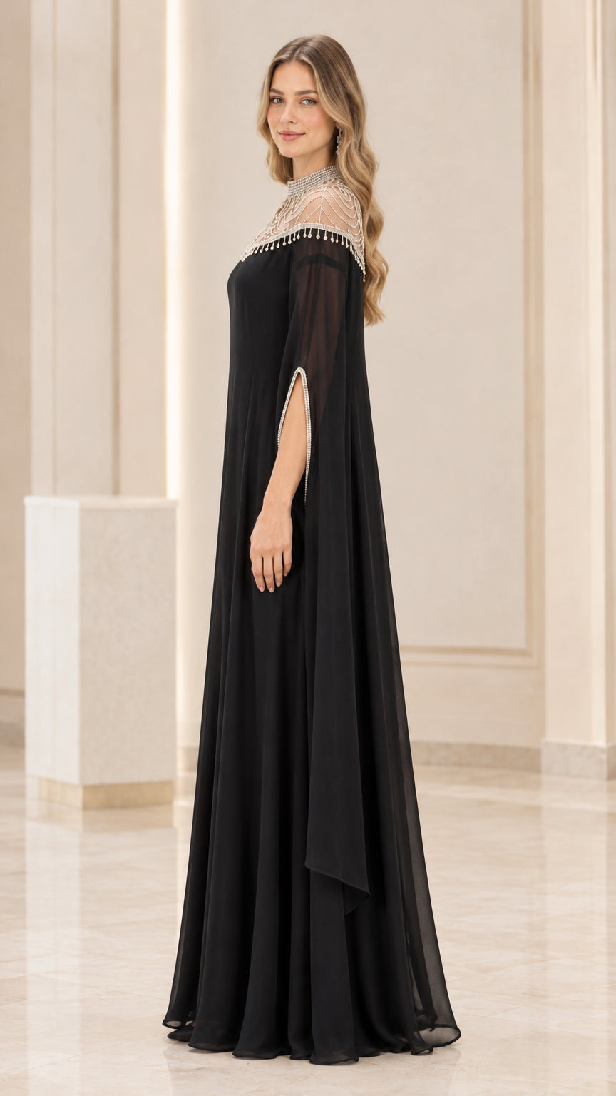 Side profile view of black cape evening maxi gown with floor-length drape