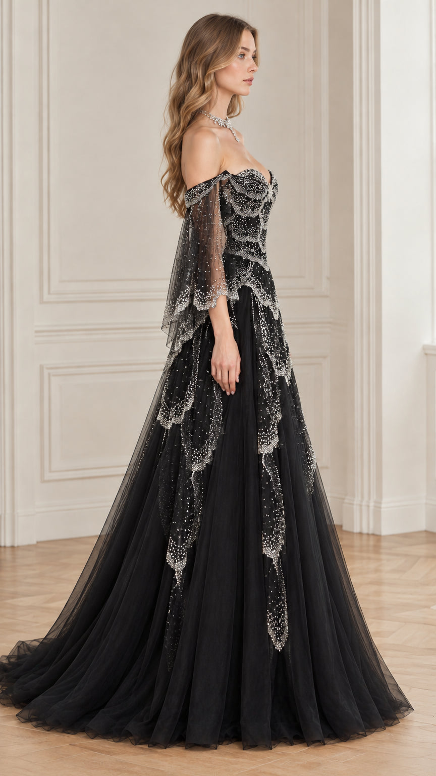 Side profile view of black crystal-beaded formal gown with sheer bell sleeves