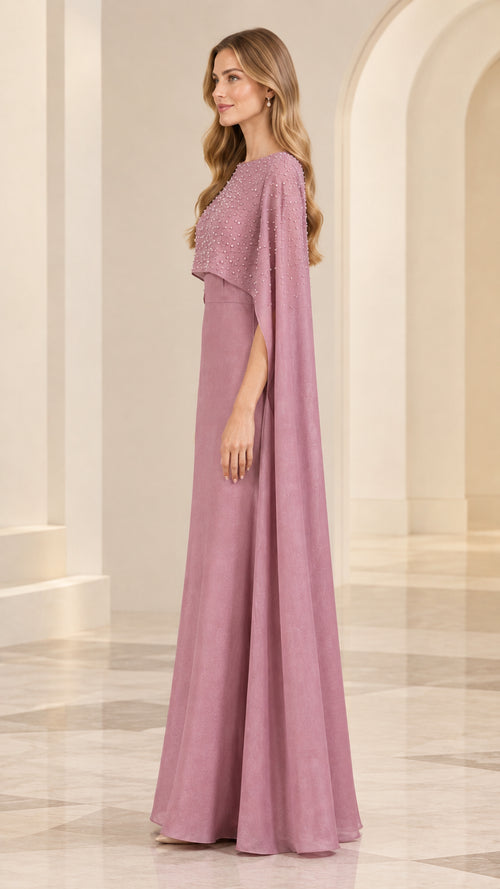 Dusty rose cape formal gown side profile view showing flowing cape sleeve