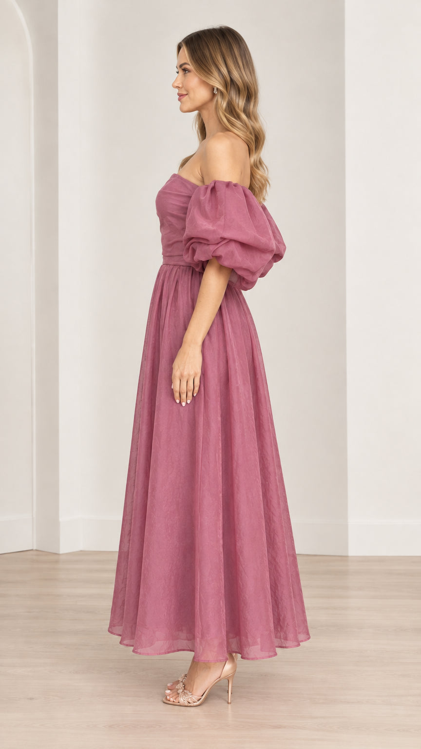 Side profile view of mauve puff sleeve off-the-shoulder A-line dress