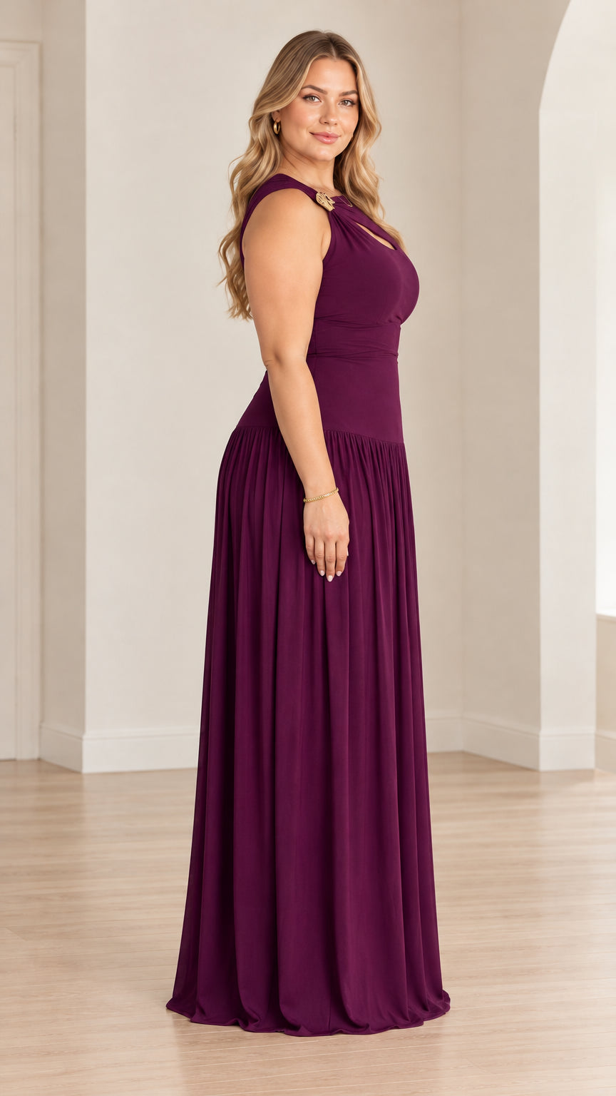 Side profile view of model wearing plum floor-length gathered evening dress