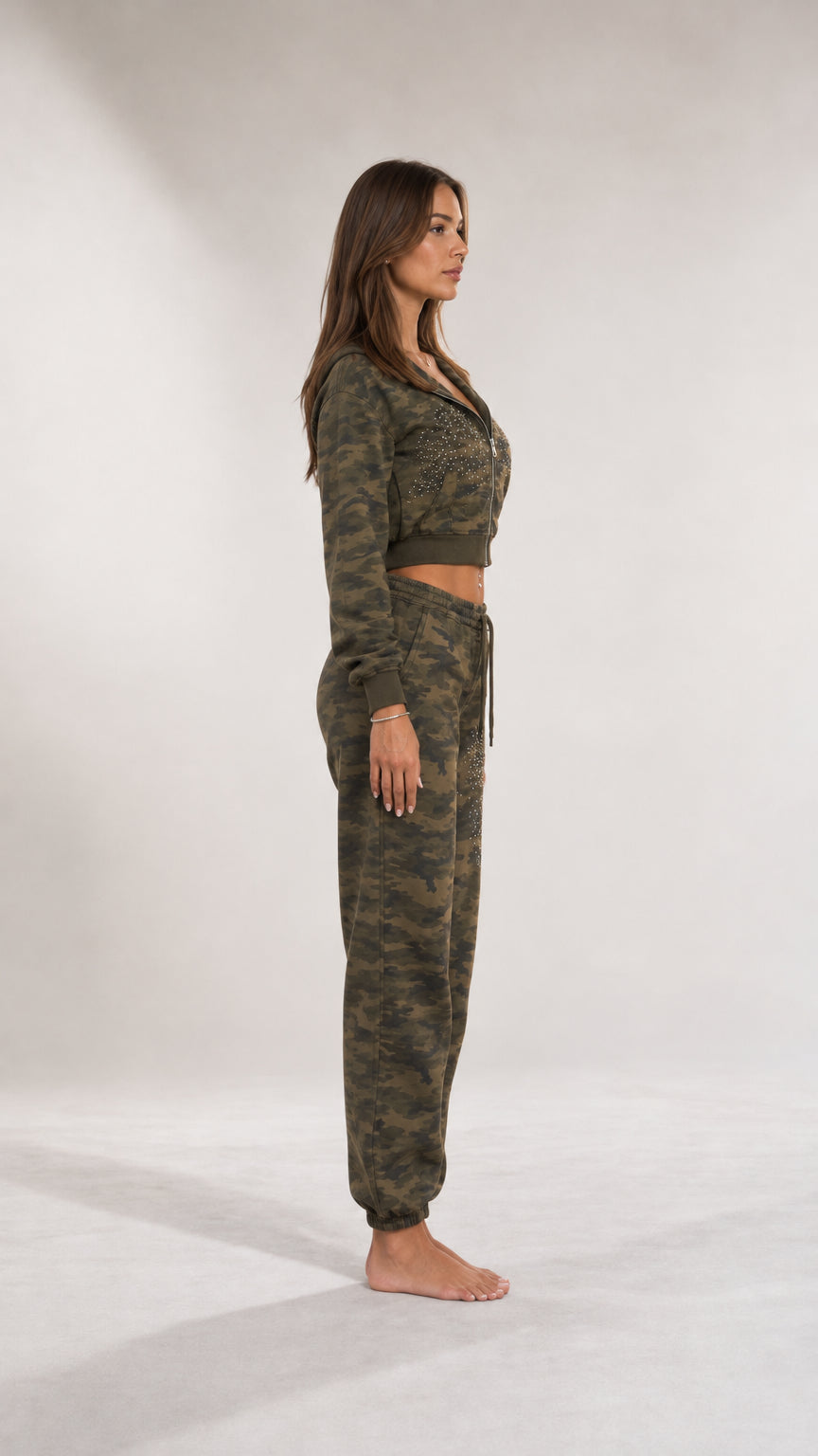 Side profile view of olive green camo cropped hoodie and jogger set