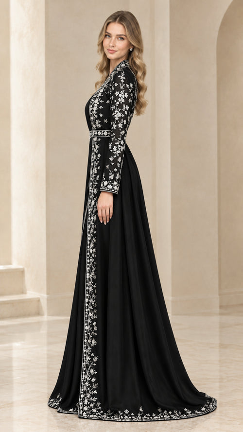 Side angle view of black embroidered evening maxi dress and floor-length duster coat