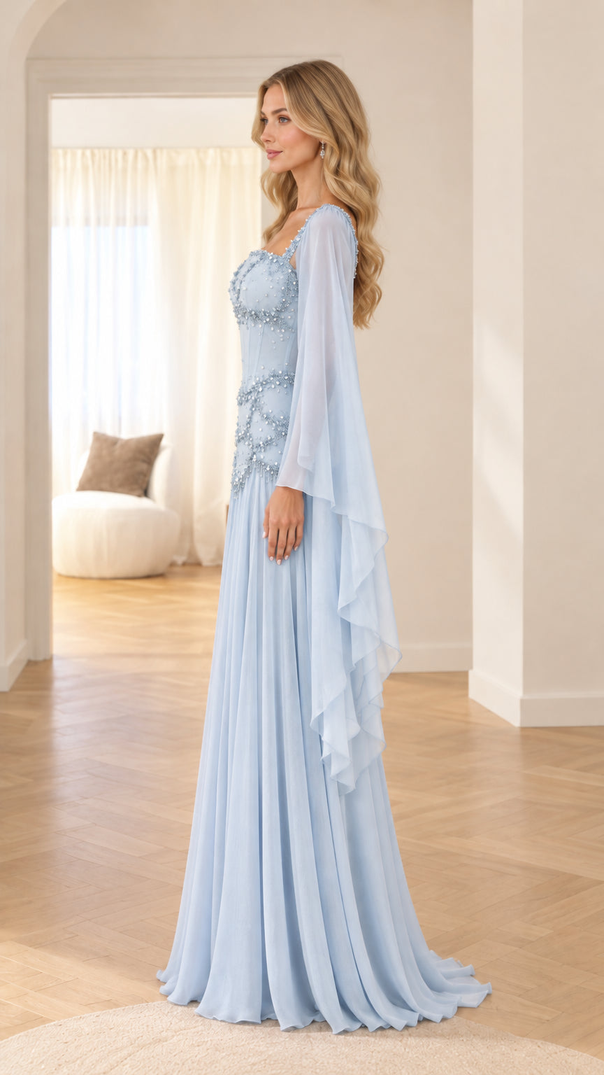 Side profile of light blue beaded corset evening gown showing flowing wing sleeve drape