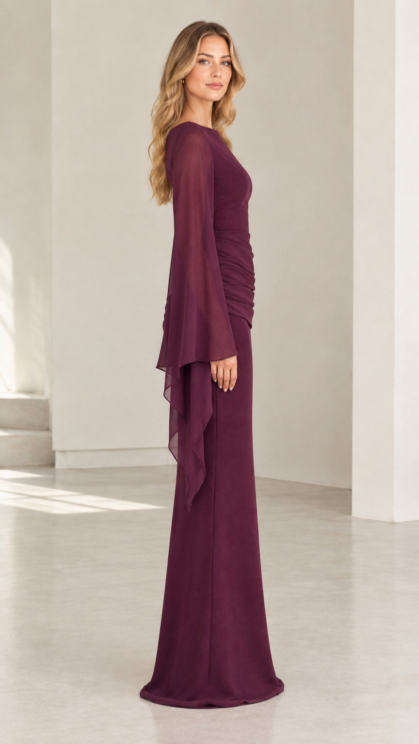 Side profile view of burgundy draped sleeve maxi dress showing sleek silhouette