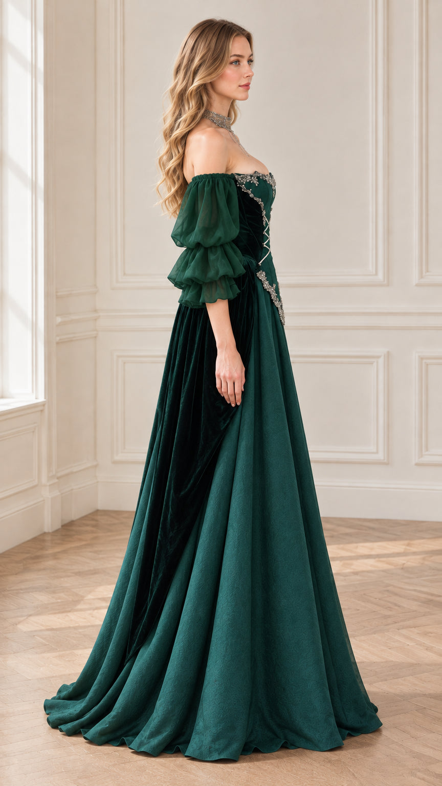 Side profile of emerald green off-the-shoulder ball gown with flowing skirt