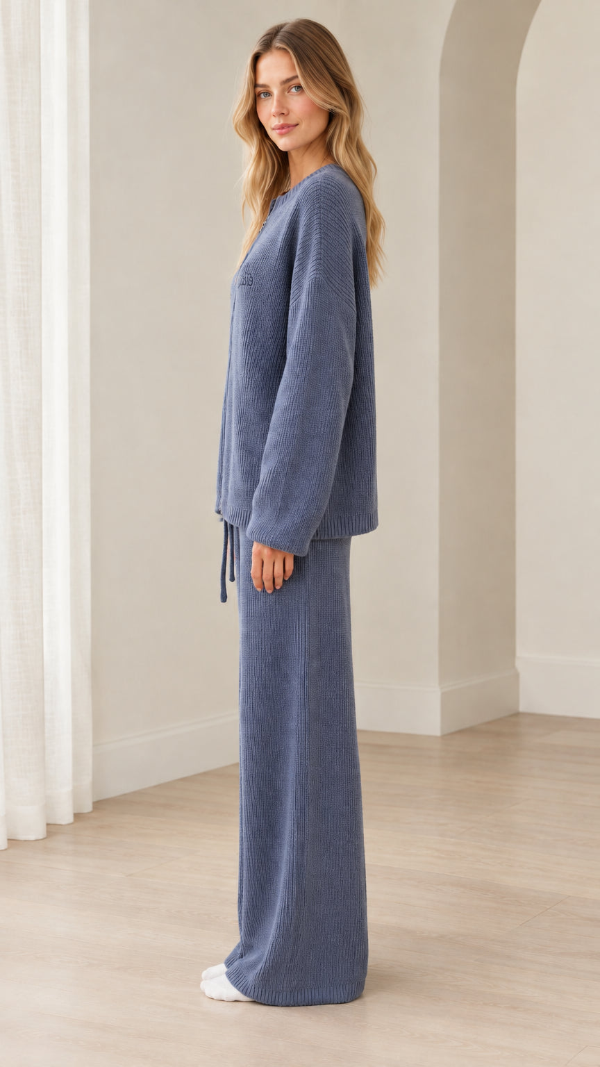 Side profile view of woman wearing Dusty Blue matching knit lounge set