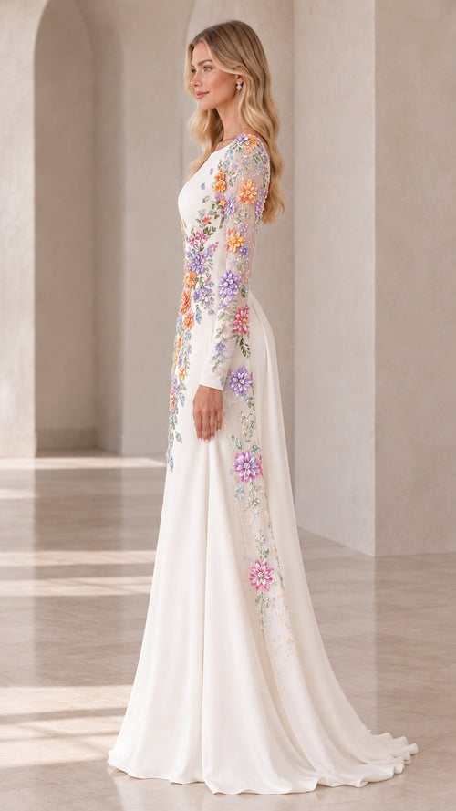 Side profile view of white floral embroidered gown showing flowing cape train