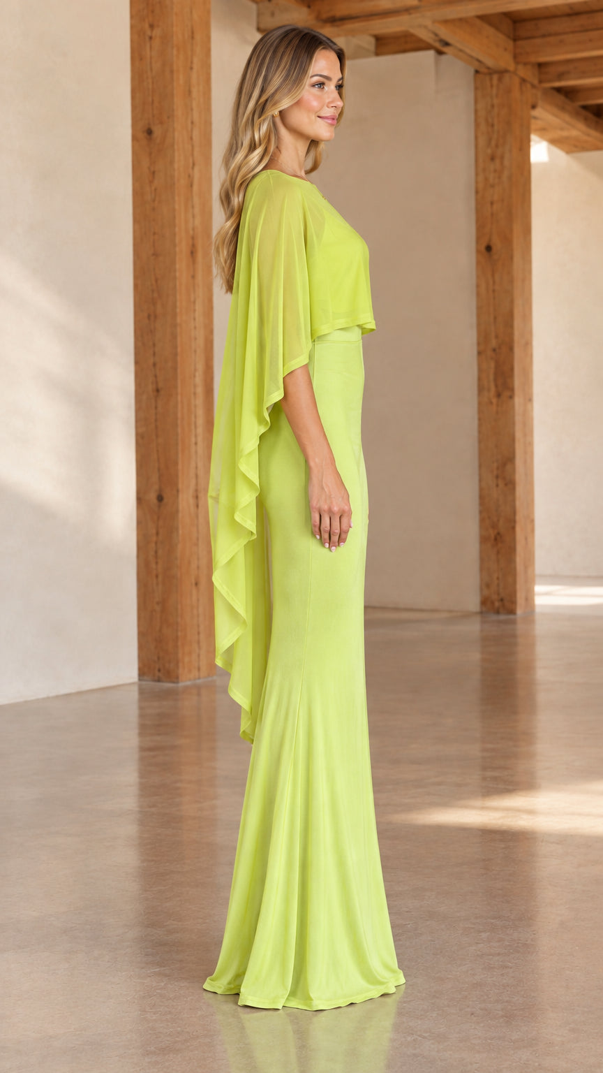 Side profile view of woman wearing lime green capelet overlay maxi dress