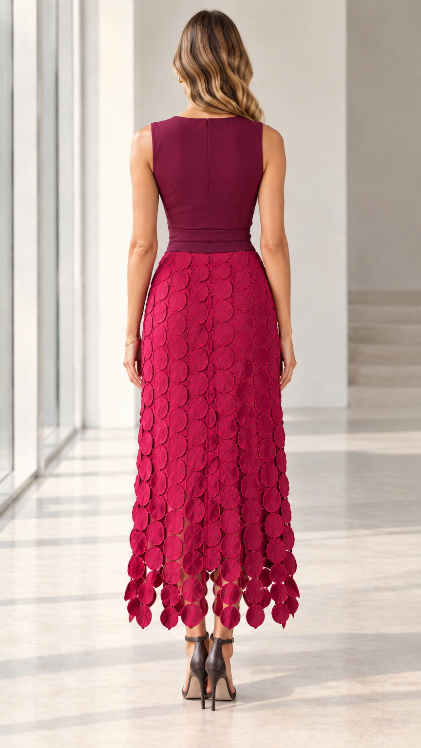 Back view of model in Berry Red sleeveless midi dress showing solid back bodice and textured skirt