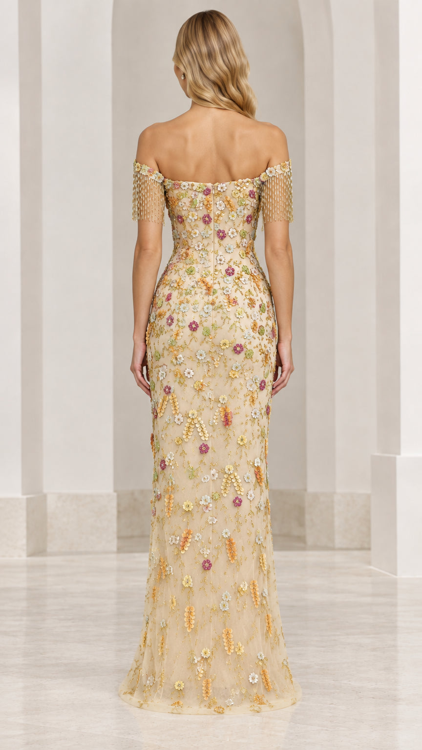 Back view of model in champagne sequin floral evening dress showing slim silhouette