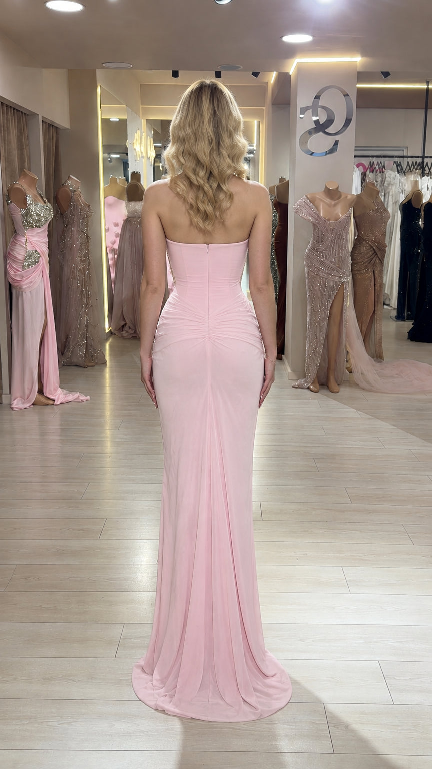 Rear view of woman modeling Light Pink strapless maxi gown