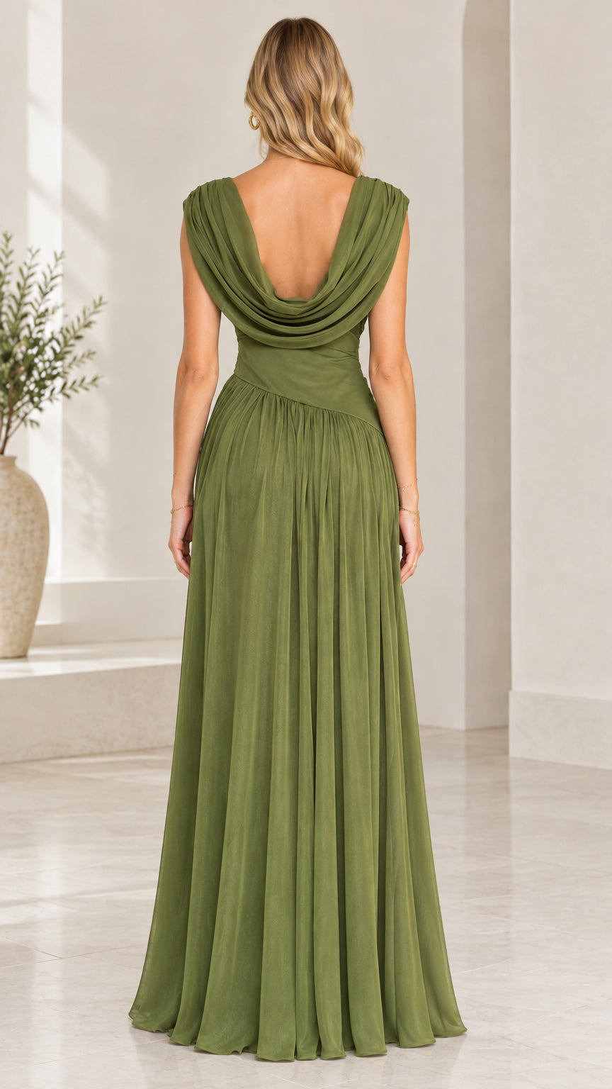 Back full-length view showcasing the low draped open cowl back on the olive green evening gown
