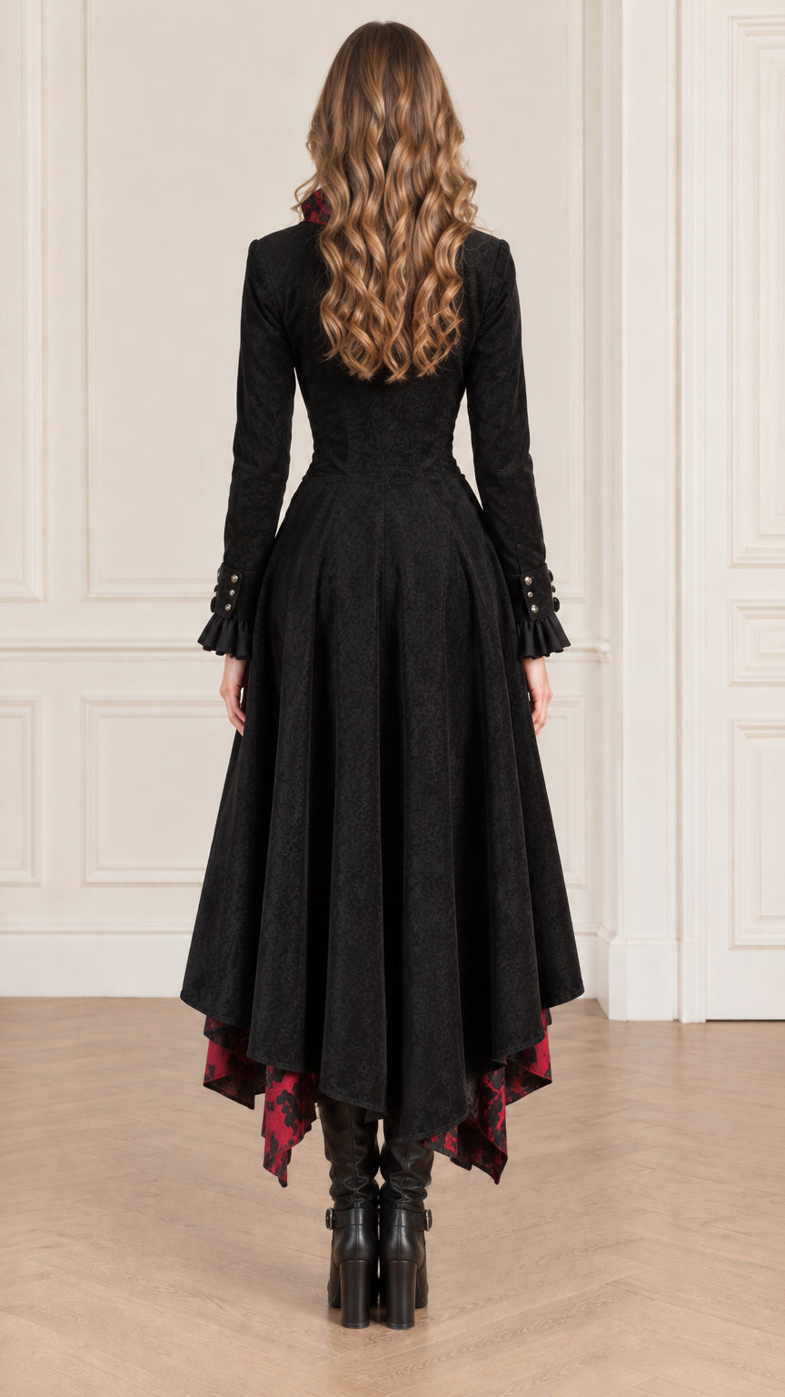 Back view of black longline gothic tailcoat showing high-low ruffled hemline