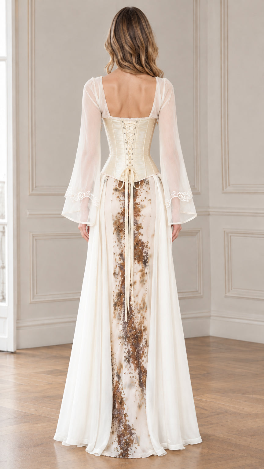 Back view of ivory corset gown highlighting lace-up corset closure and train