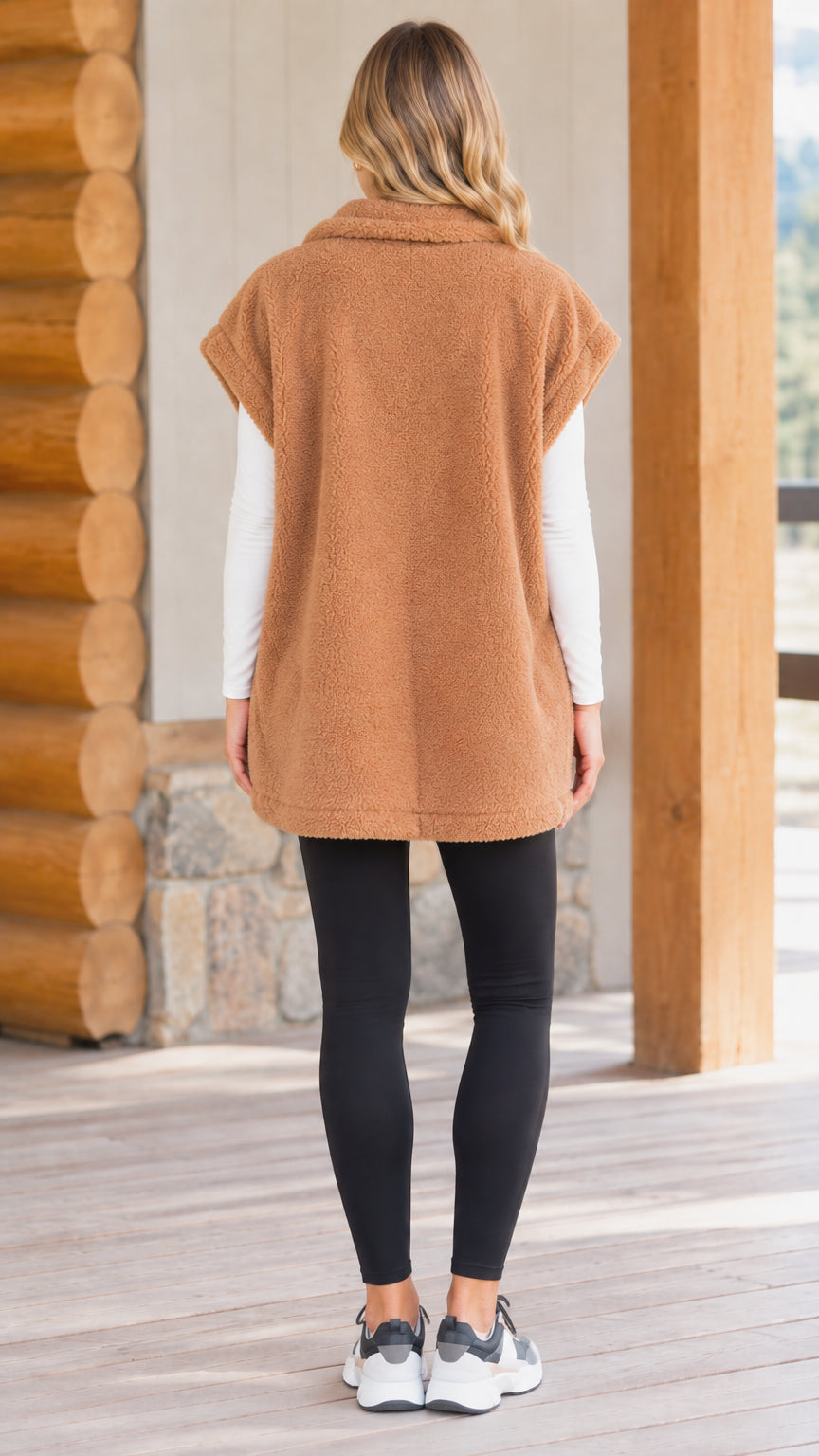 Back view of model wearing camel longline teddy fleece vest