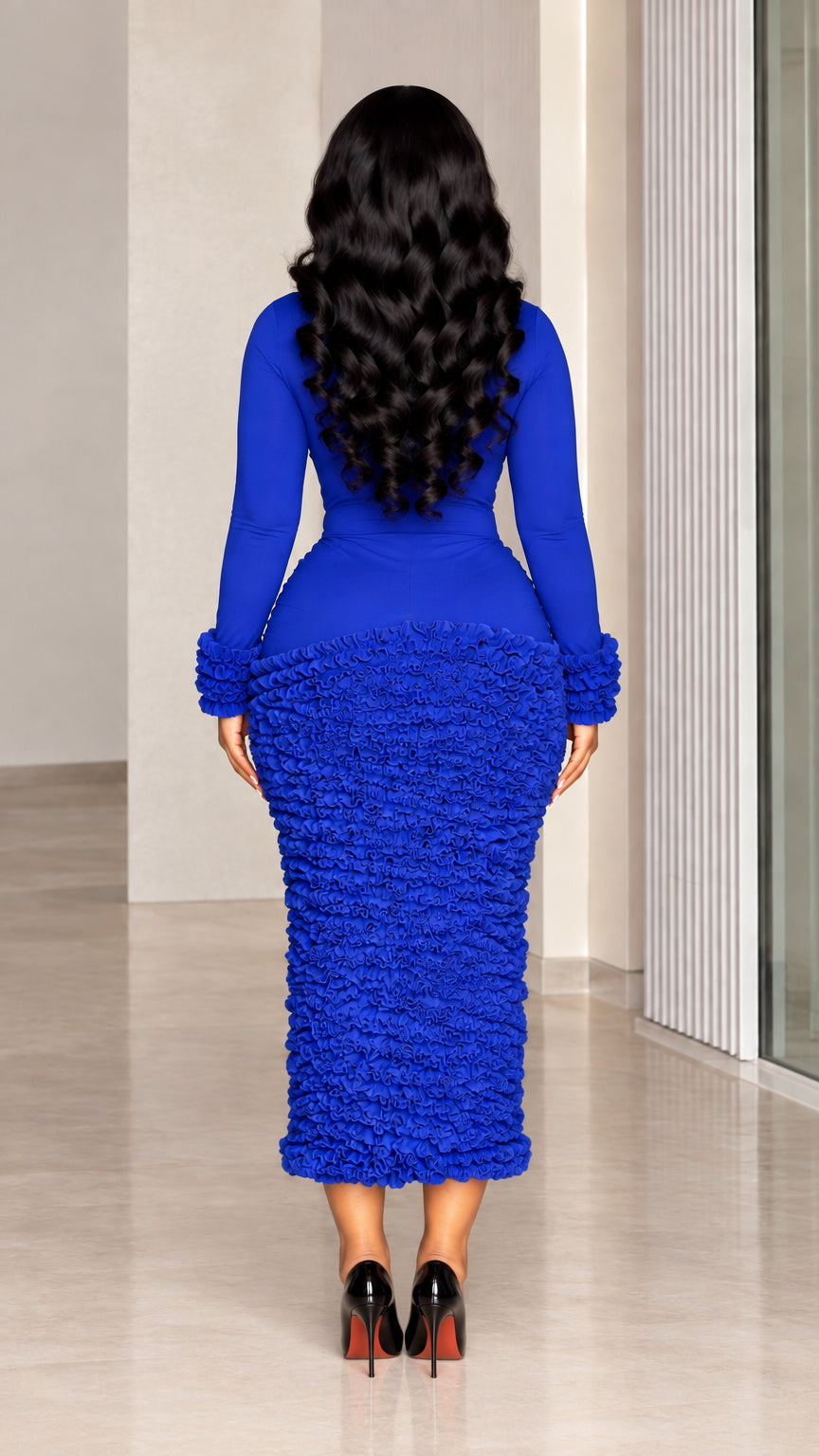 Back full view of woman wearing Royal Blue long sleeve midi dress with back slit