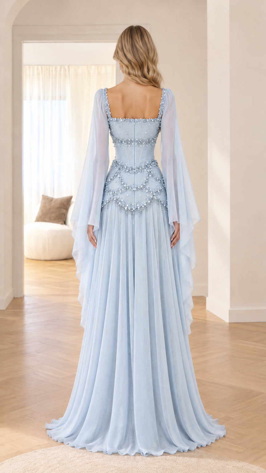 Back view of light blue corset maxi dress highlighting floor-length gathered chiffon skirt