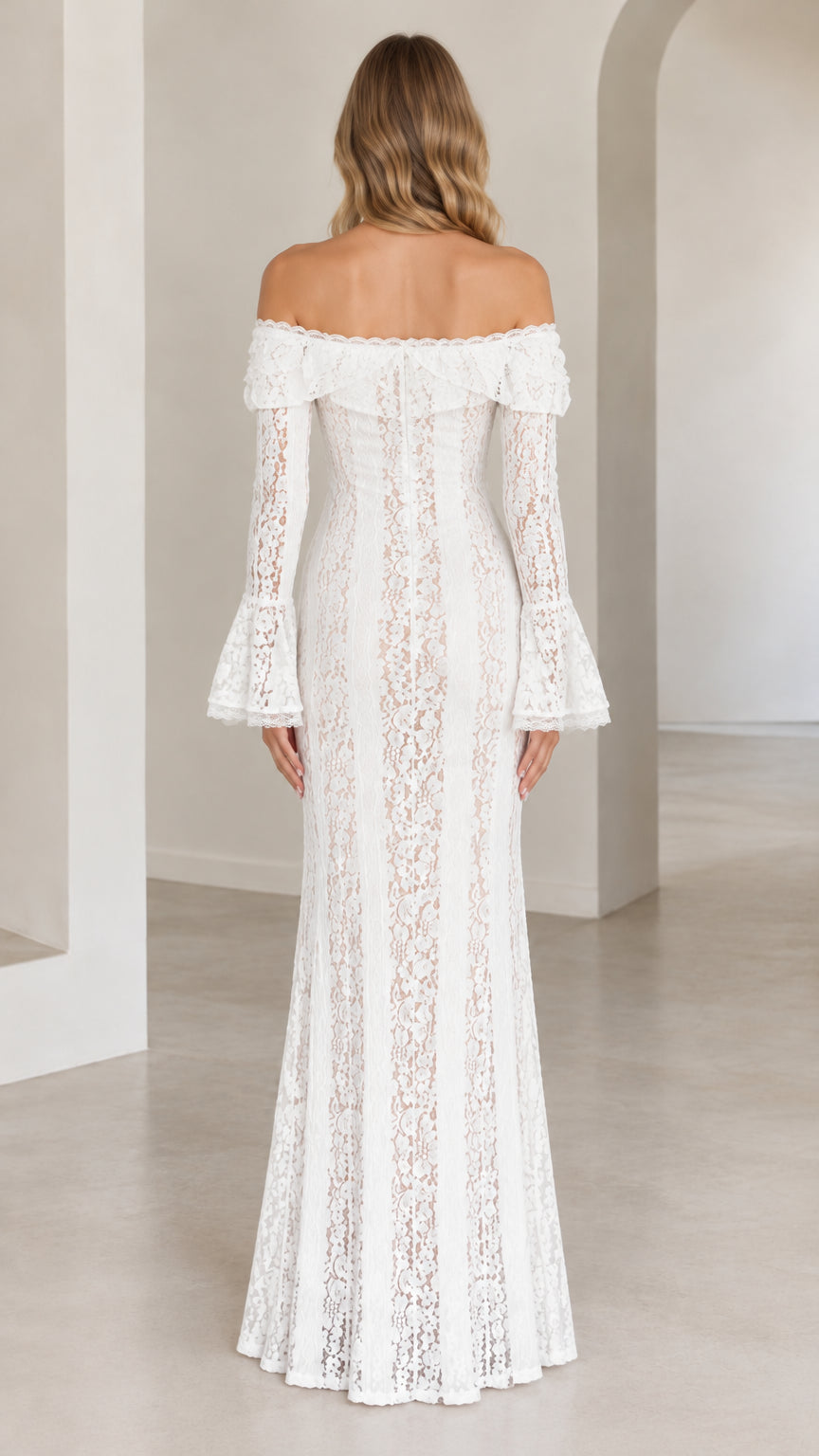 Back view of model wearing white off-the-shoulder lace evening gown