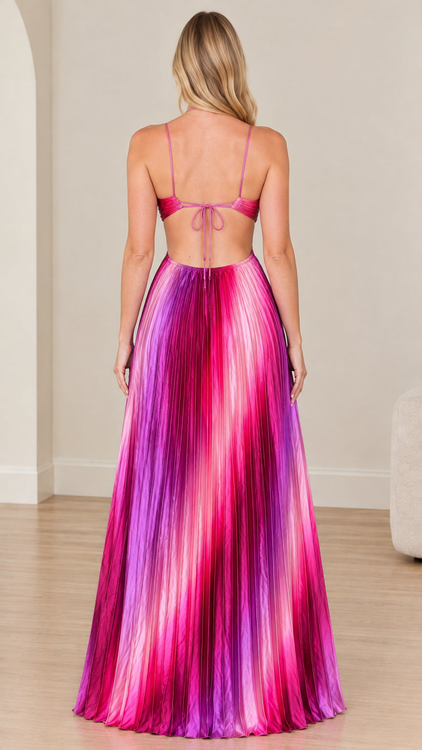 Back view of model showing open tie back on magenta ombre pleated dress
