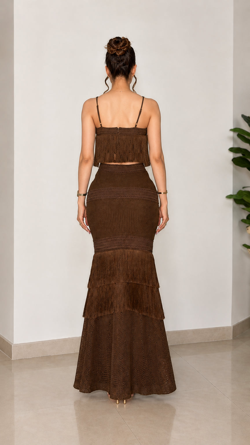 Back view of brown fringe crop top and tiered mermaid skirt set