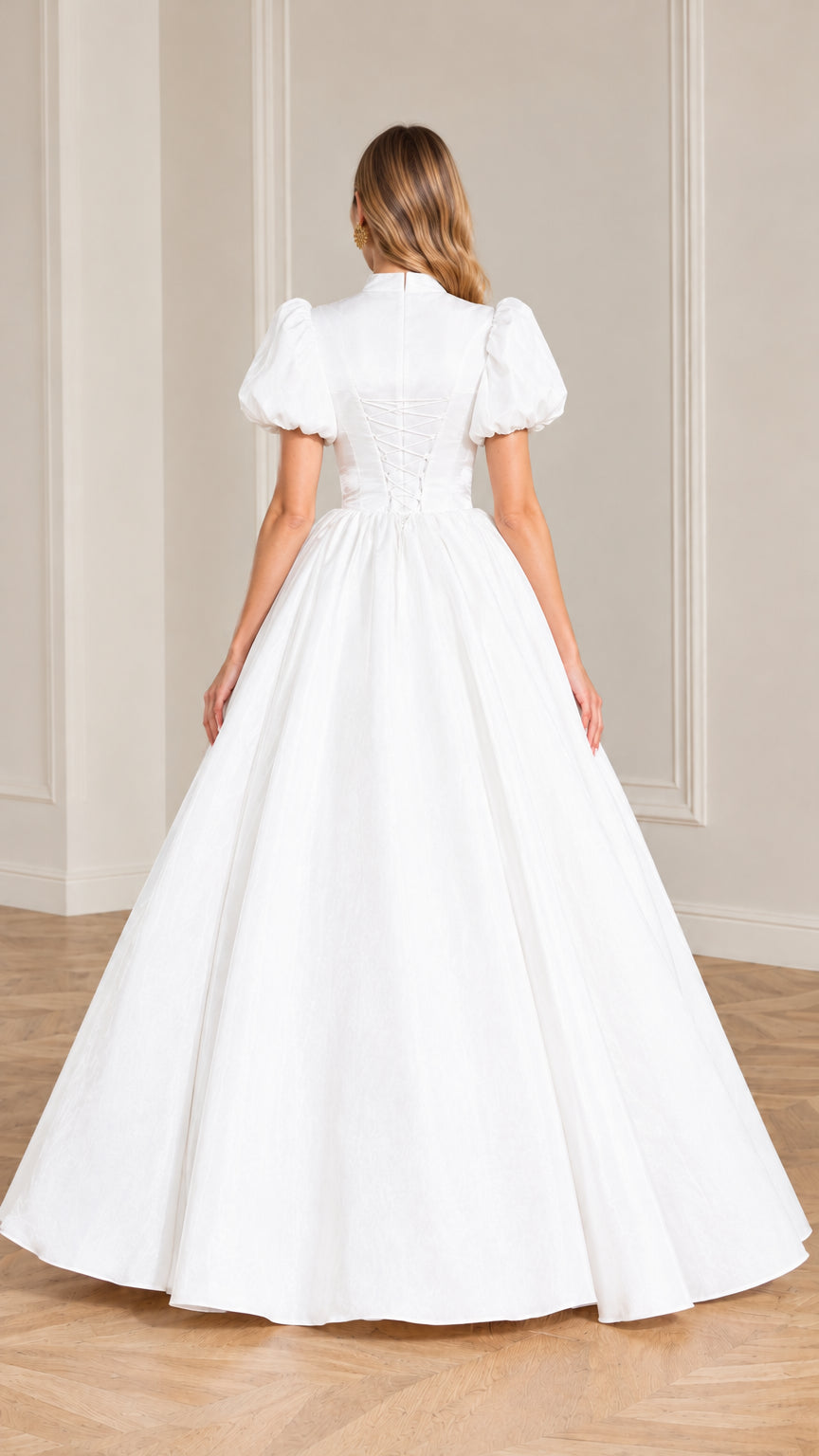 Back view of the white puff sleeve formal ball gown dress showing structured fit