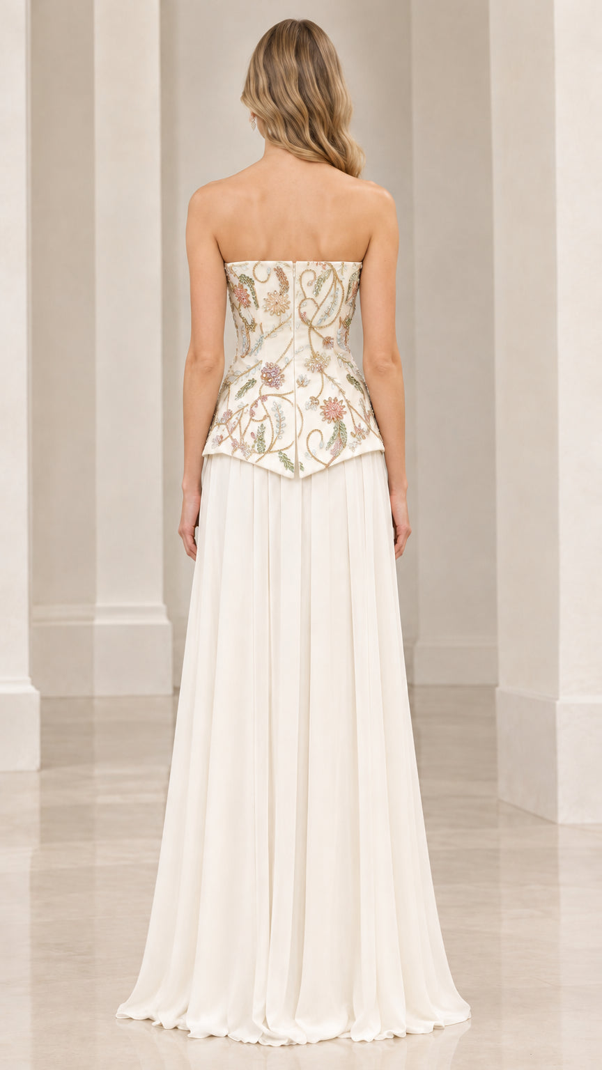Back full-length view of ivory embroidered corset evening gown