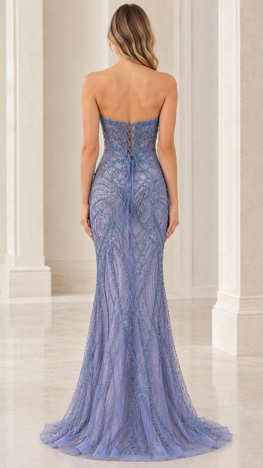 Back view showing corset lace-up closure on dusty blue formal gown