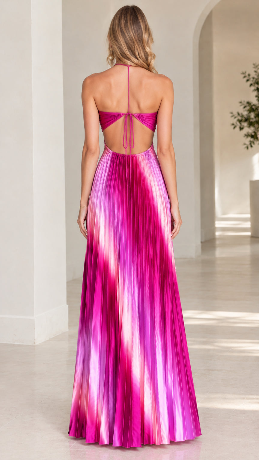 Back view of model wearing pink ombre open back halter pleated gown