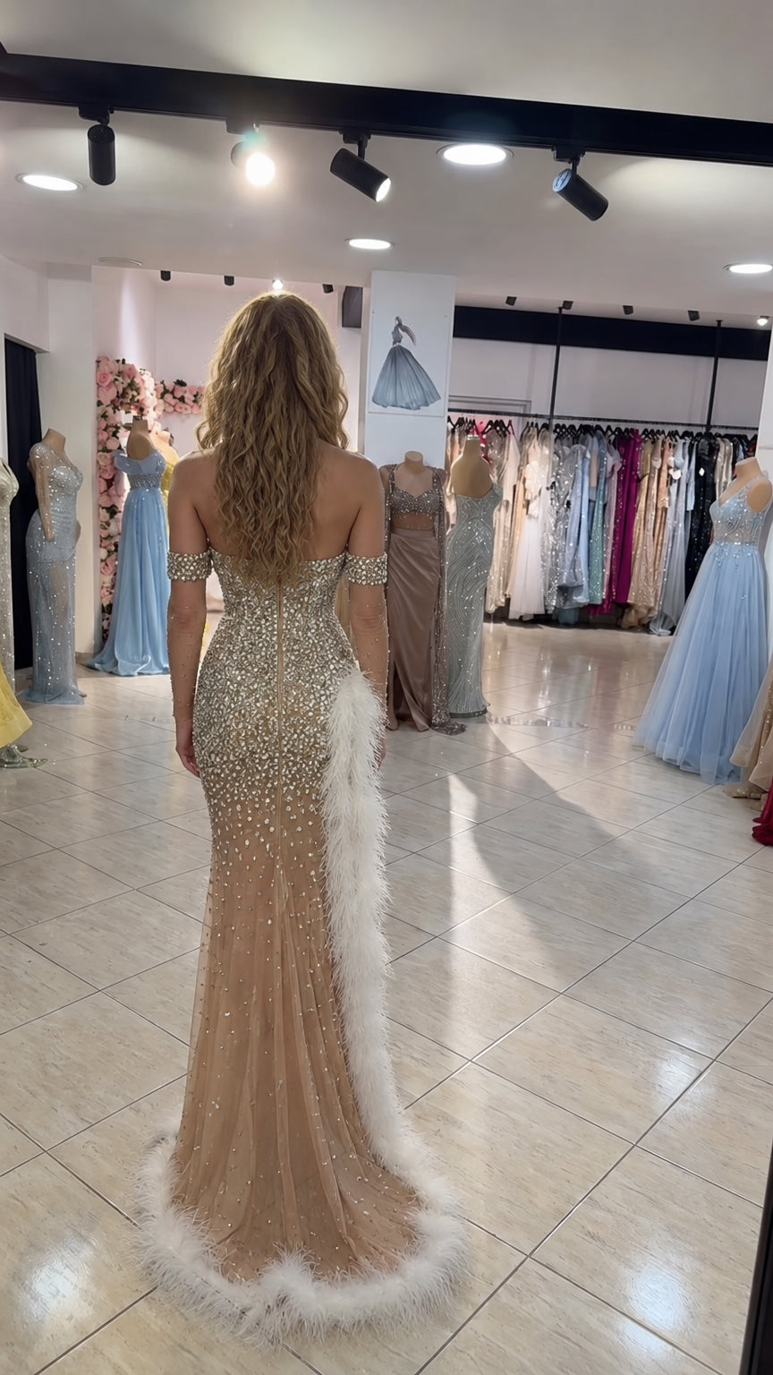 Model wearing Champagne floor-length embellished formal gown back view