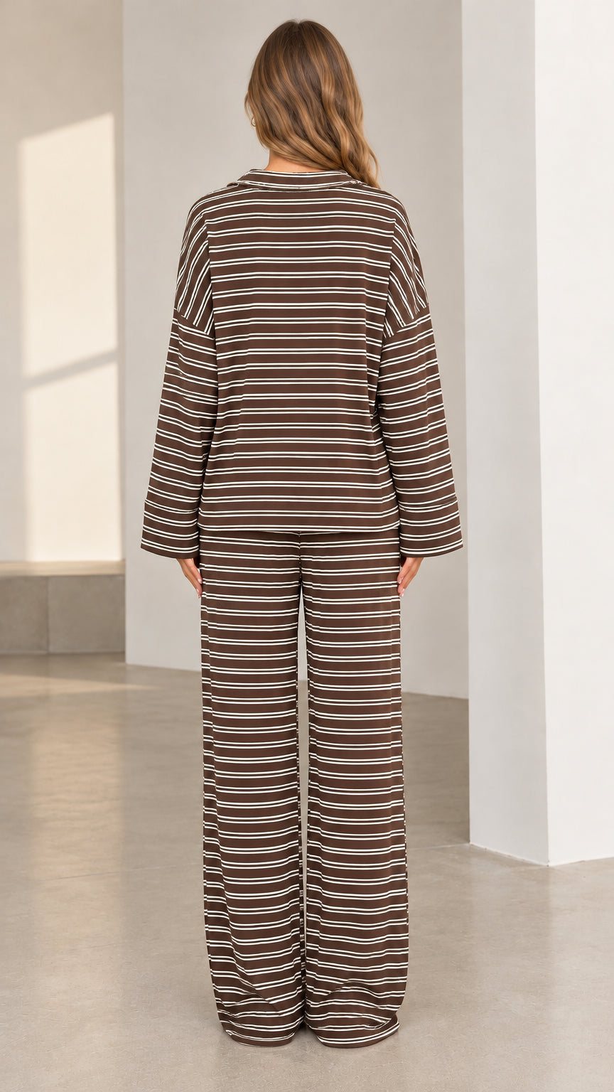 Back full view of woman wearing brown striped two-piece loungewear set