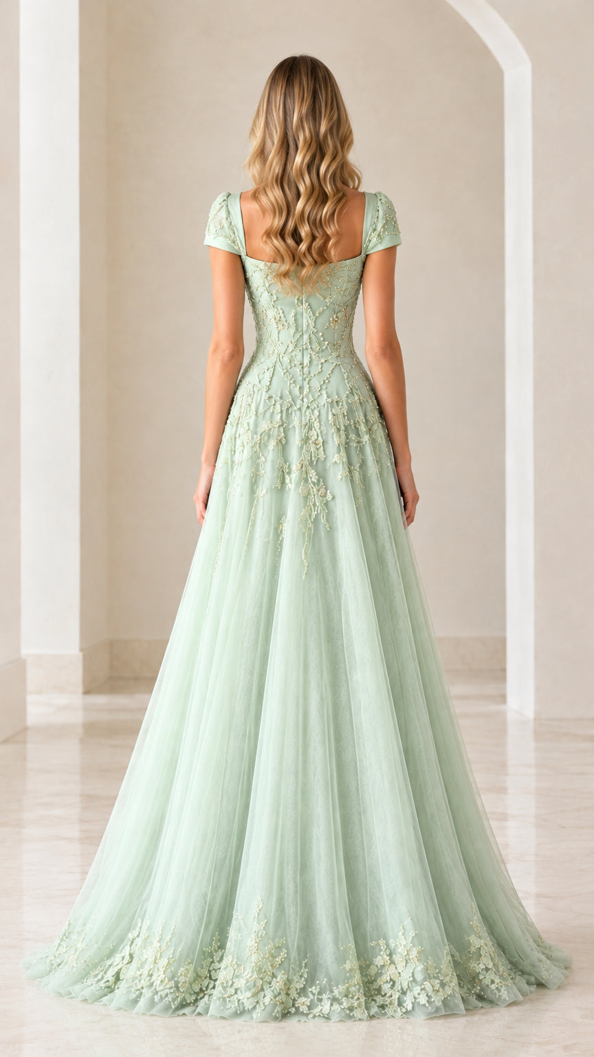 Back view of sage green cap-sleeve formal tulle evening dress