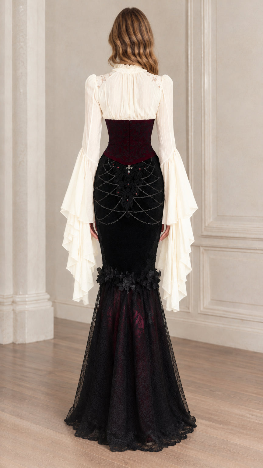 Back view of model showcasing fitted bodice and flared train hemline