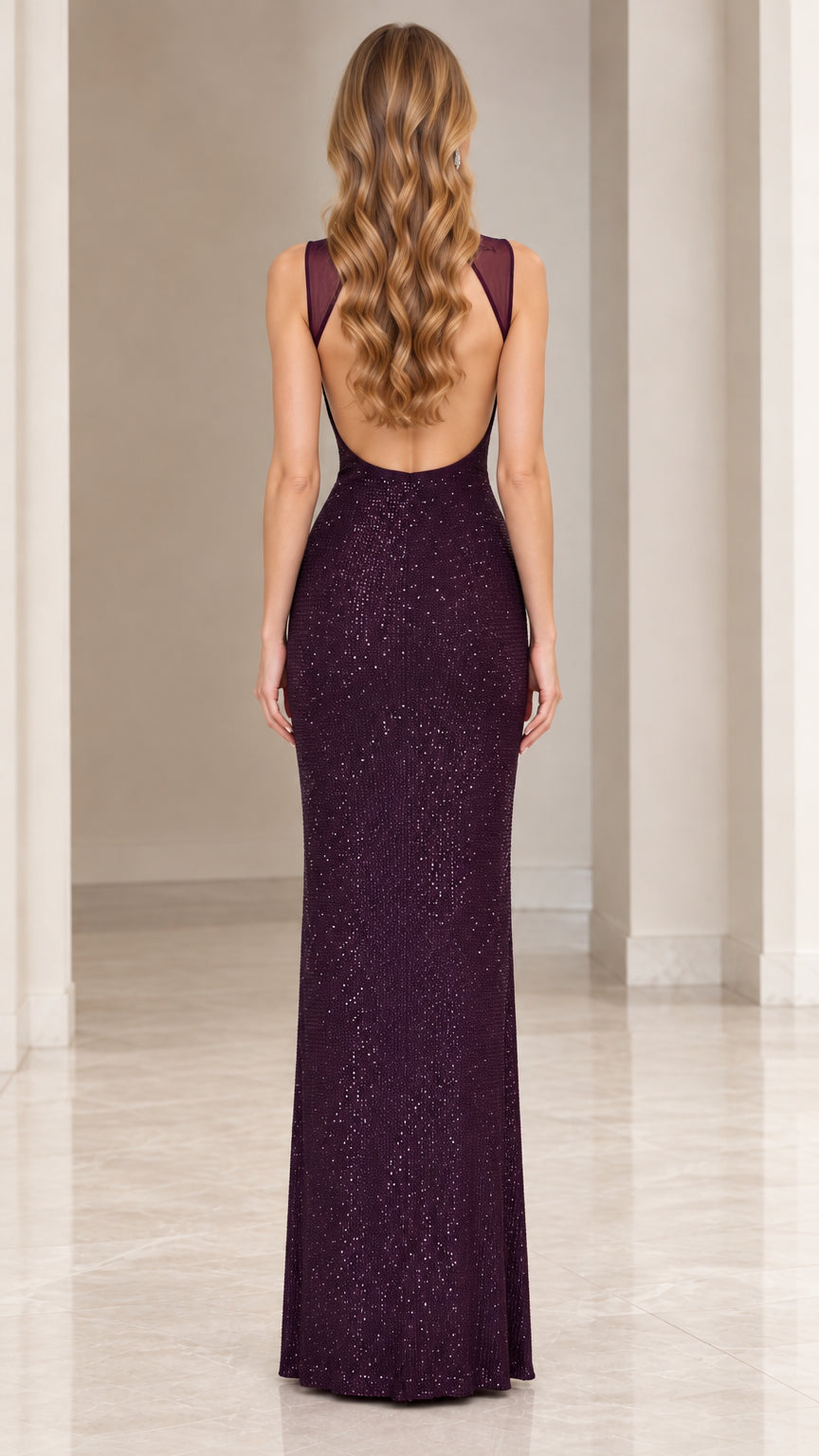 Back view showcasing deep open-back cut and sheer straps of dark purple sequin gown