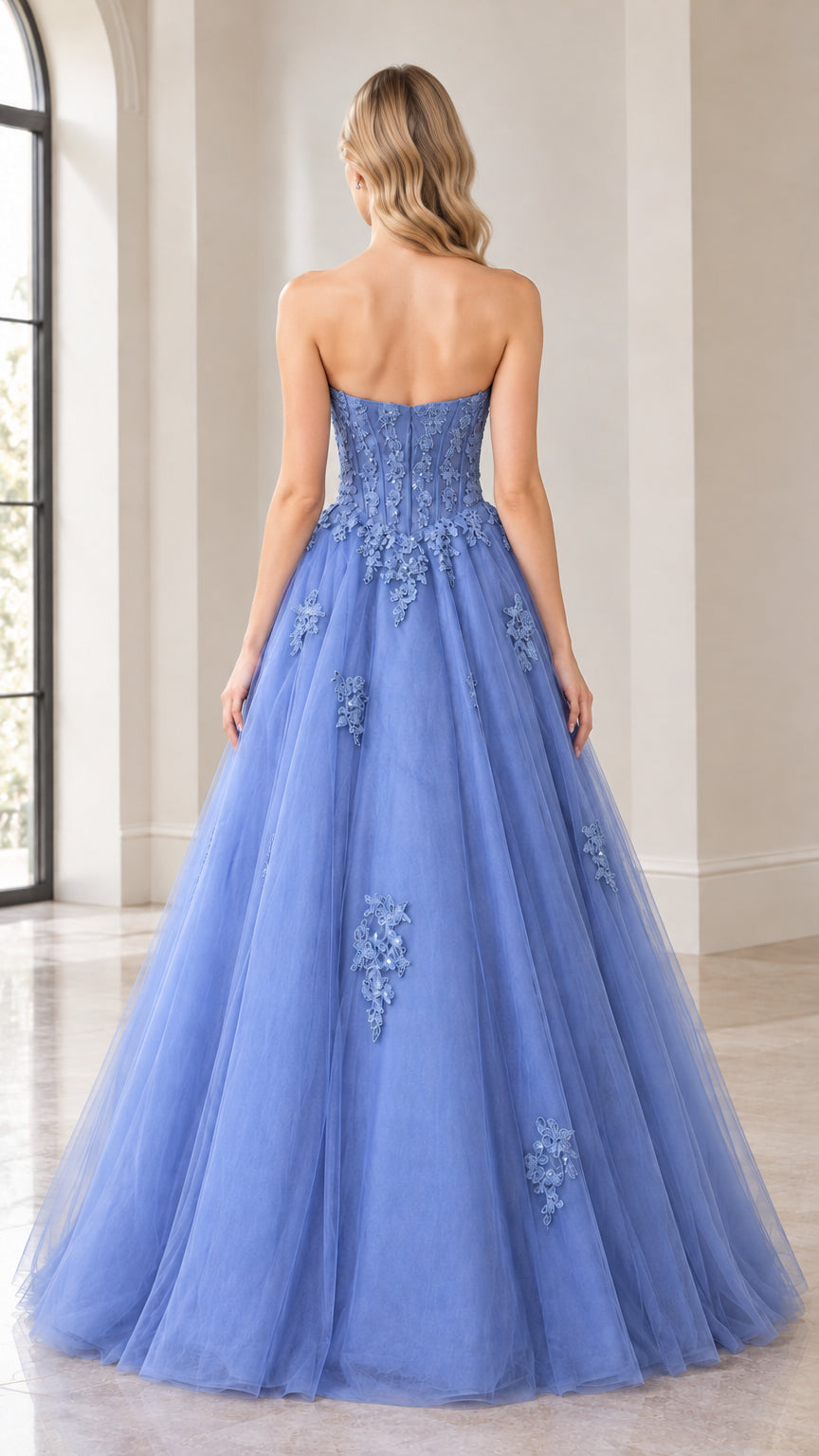 Back view of blue strapless corset ballgown showing boning and layered tulle
