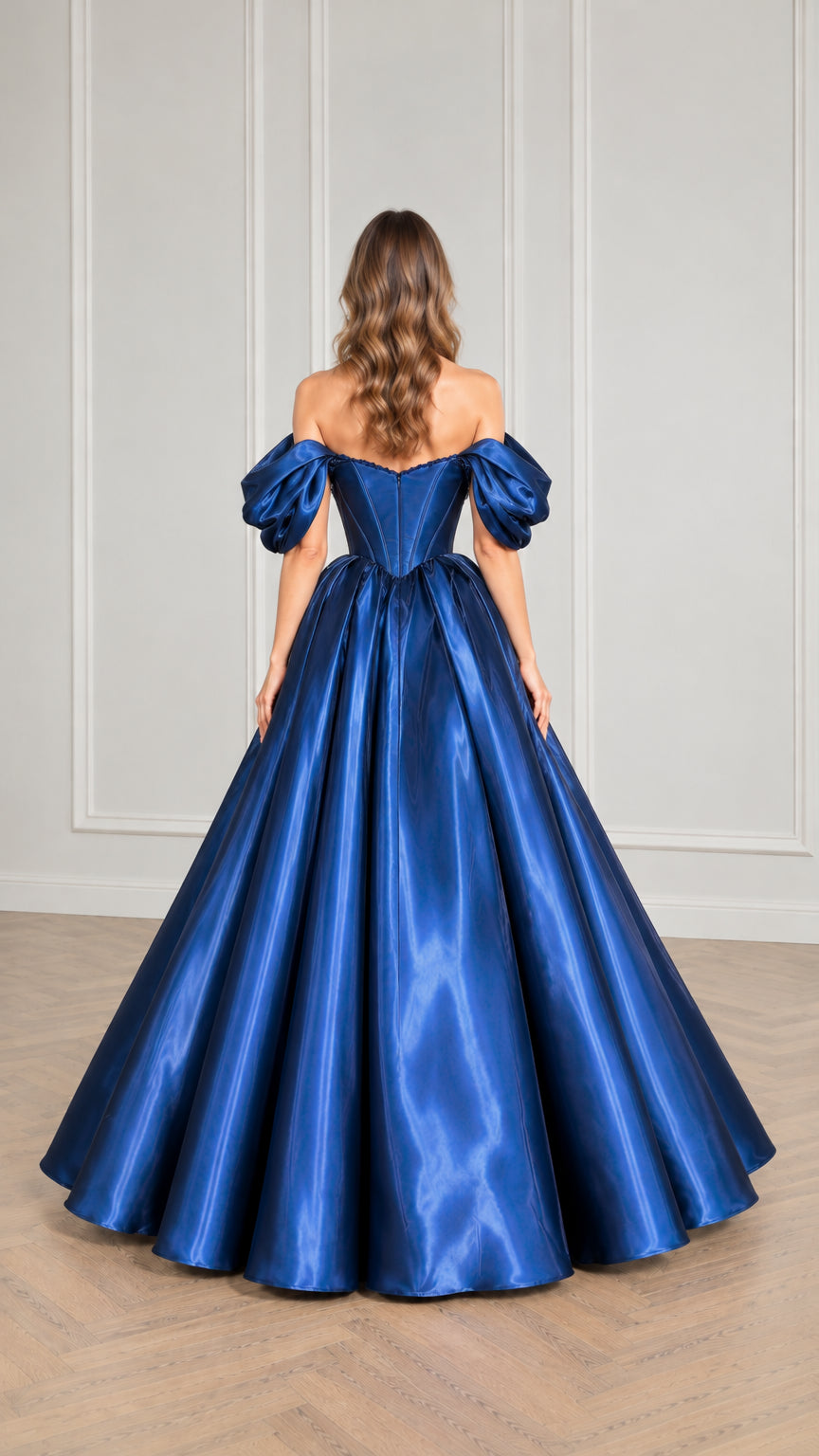 Back view of woman wearing royal blue satin corset maxi ball gown